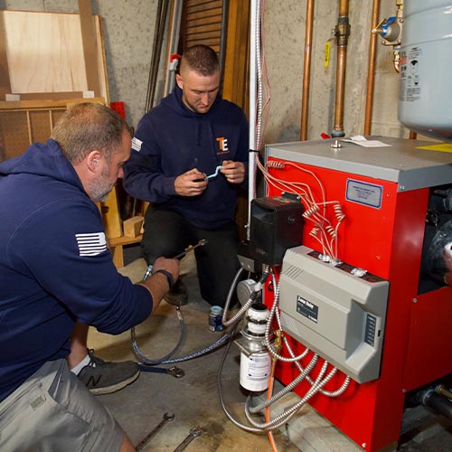 HVAC technicians on the job